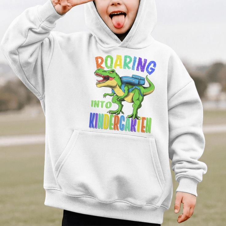 Roaring Into Kindergarten DinosaurRex Back To School Boys Performance Graphic Kid Hoodie Roaring Into Kindergarten DinosaurRex Back To School Boys Performance Graphic Kid Hoodie