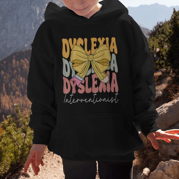 Dyslexia Interventionist Groovy Coquette Bow Back To School Graphic Kid Hoodie Dyslexia Interventionist Groovy Coquette Bow Back To School Graphic Kid Hoodie