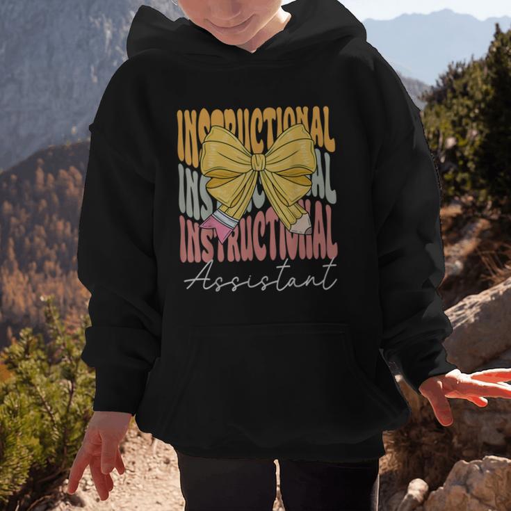 Instructional Assistant Groovy Coquette Bow Back To School Graphic Kid Hoodie Instructional Assistant Groovy Coquette Bow Back To School Graphic Kid Hoodie