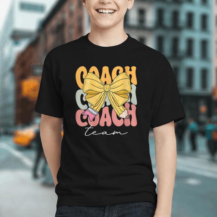 Groovy Coach Team Coquette Bow Back to School Youth T-Shirt Groovy Coach Team Coquette Bow Back to School Youth T-Shirt
