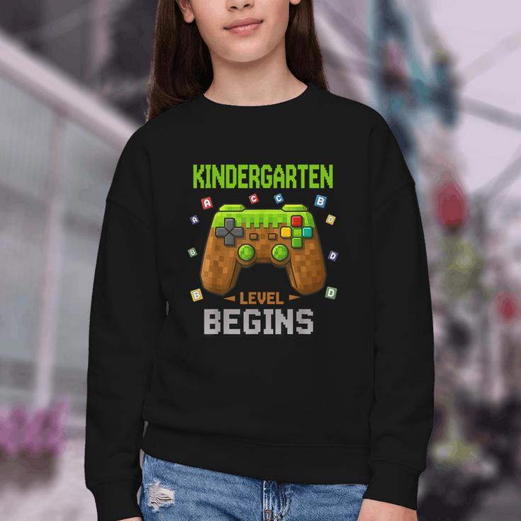 First Day Of Kindergarten Level Begins Back To School Youth Crewneck Sweatshirt
