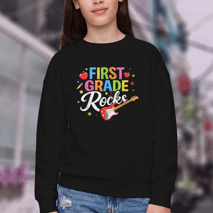 First Grade Rocks Colorful Back To School Guitar Youth Crewneck Sweatshirt First Grade Rocks Colorful Back To School Guitar Youth Crewneck Sweatshirt