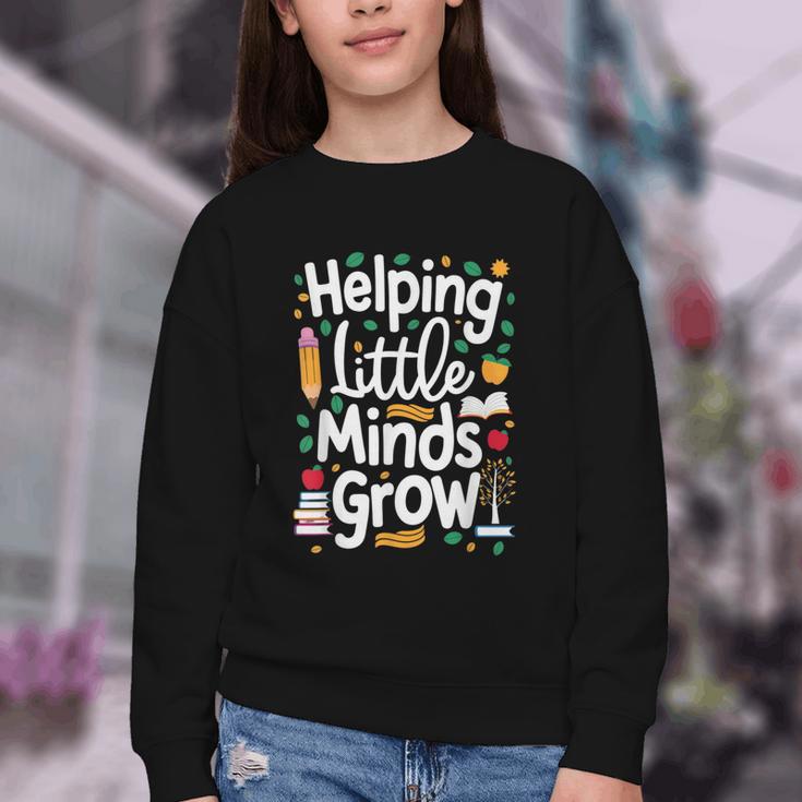 Women's Helping Little Minds Grow Back To School Apparel Youth Crewneck Sweatshirt Women's Helping Little Minds Grow Back To School Apparel Youth Crewneck Sweatshirt