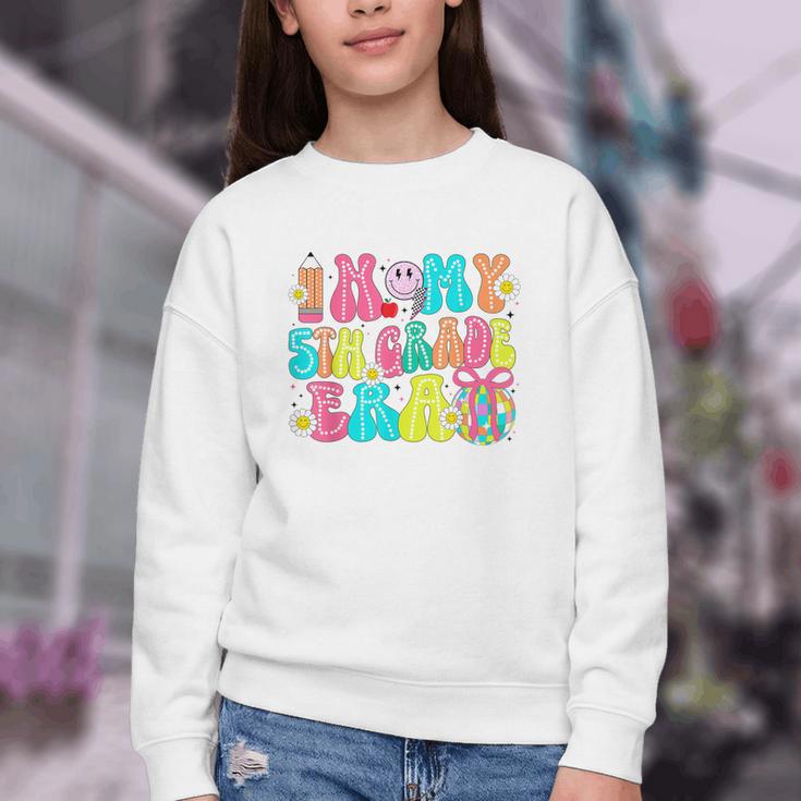 In My 5th Grade Era Coquette Bow Back To School Fifth Grade Youth Crewneck Sweatshirt In My 5th Grade Era Coquette Bow Back To School Fifth Grade Youth Crewneck Sweatshirt