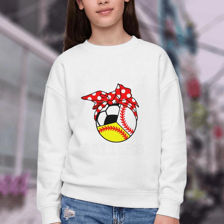 Busy Raising Ballers Baseball Softball Soccer Mom Premium Tri-Blend Youth Crewneck Sweatshirt Busy Raising Ballers Baseball Softball Soccer Mom Premium Tri-Blend Youth Crewneck Sweatshirt
