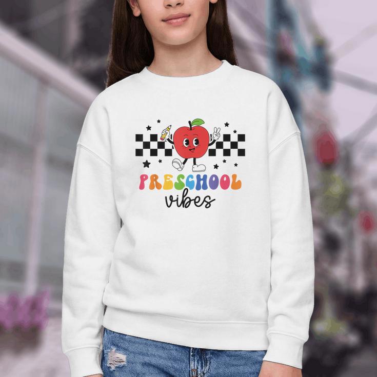 Preschool Vibes Retro Groovy Apple Back To School Youth Crewneck Sweatshirt Preschool Vibes Retro Groovy Apple Back To School Youth Crewneck Sweatshirt