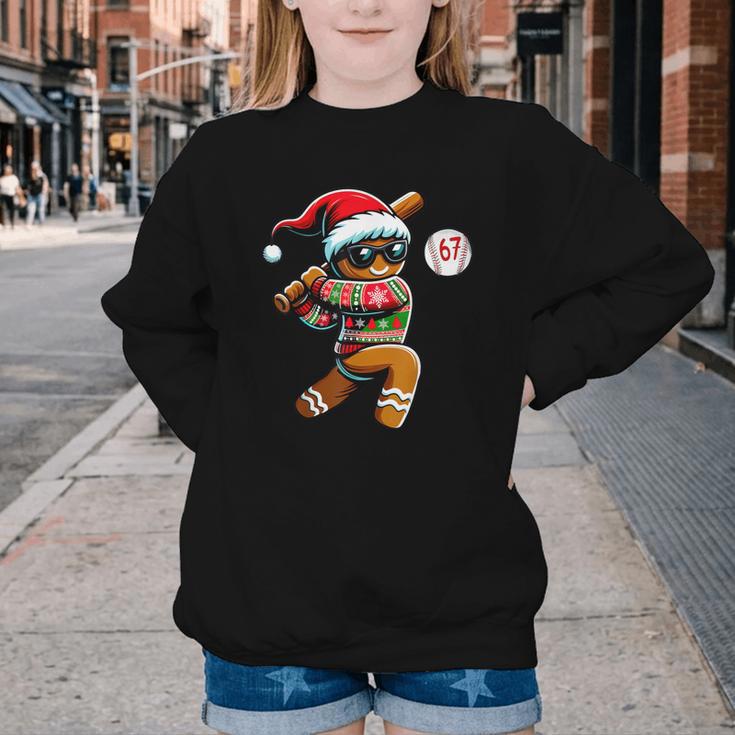 67 Gingerbread Man Playing Baseball Christmas 6 7 Meme Youth Crewneck Sweatshirt 67 Gingerbread Man Playing Baseball Christmas 6 7 Meme Youth Crewneck Sweatshirt