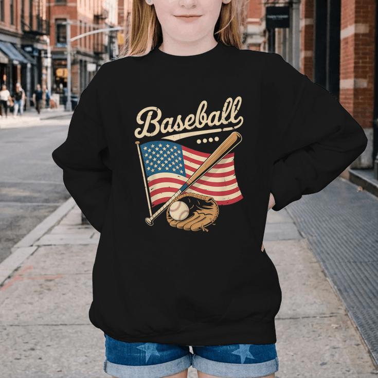 American Flag Baseball Player Bat Fan Catcher Pitcher USA Youth Crewneck Sweatshirt American Flag Baseball Player Bat Fan Catcher Pitcher USA Youth Crewneck Sweatshirt