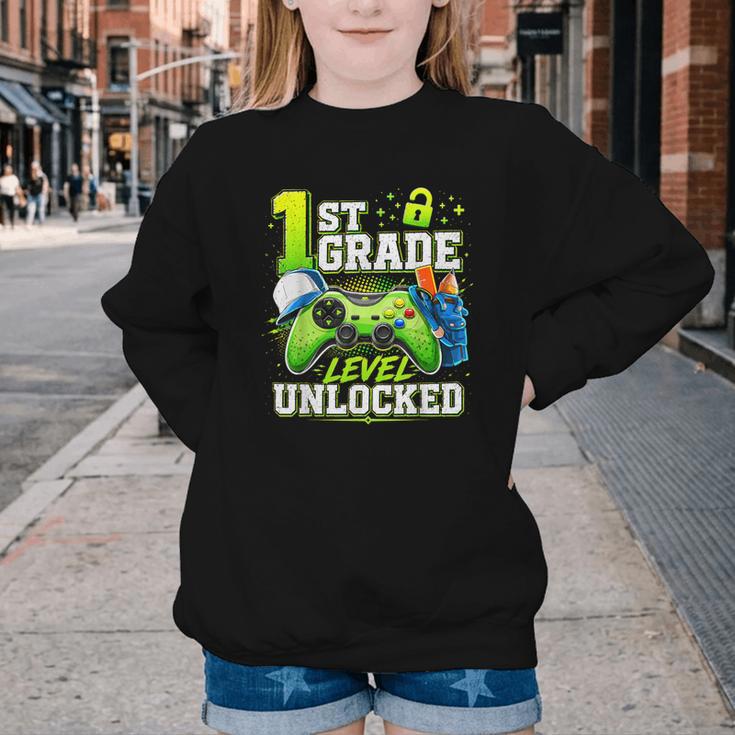 Back To School 1st First Grade Level Unlocked Gamer Kid Youth Crewneck Sweatshirt Back To School 1st First Grade Level Unlocked Gamer Kid Youth Crewneck Sweatshirt
