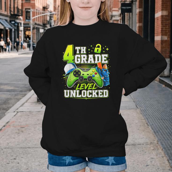 Back To School 4th Fourth Grade Level Unlocked Gamer Kid Youth Crewneck Sweatshirt Back To School 4th Fourth Grade Level Unlocked Gamer Kid Youth Crewneck Sweatshirt