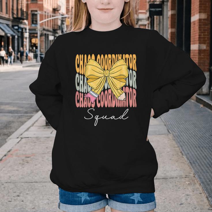 Chaos Coordinator Squad Groovy Coquette Bow Back To School Youth Crewneck Sweatshirt