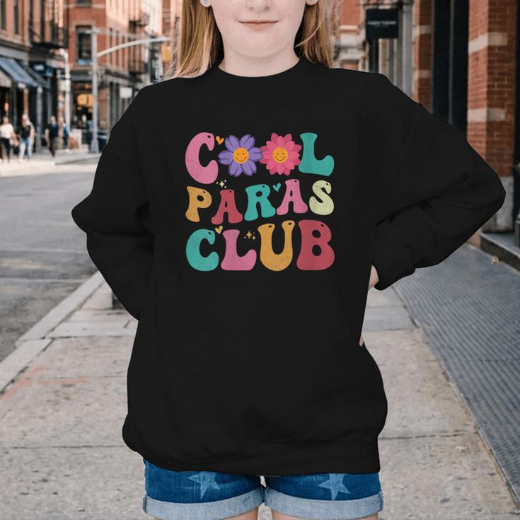 Cool Paras Club Paraprofessional Groovy Back To School Youth Crewneck Sweatshirt Cool Paras Club Paraprofessional Groovy Back To School Youth Crewneck Sweatshirt