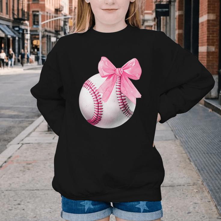 Cute Coquette Baseball Pink Bow Player & Fan Girls Youth Crewneck Sweatshirt Cute Coquette Baseball Pink Bow Player & Fan Girls Youth Crewneck Sweatshirt