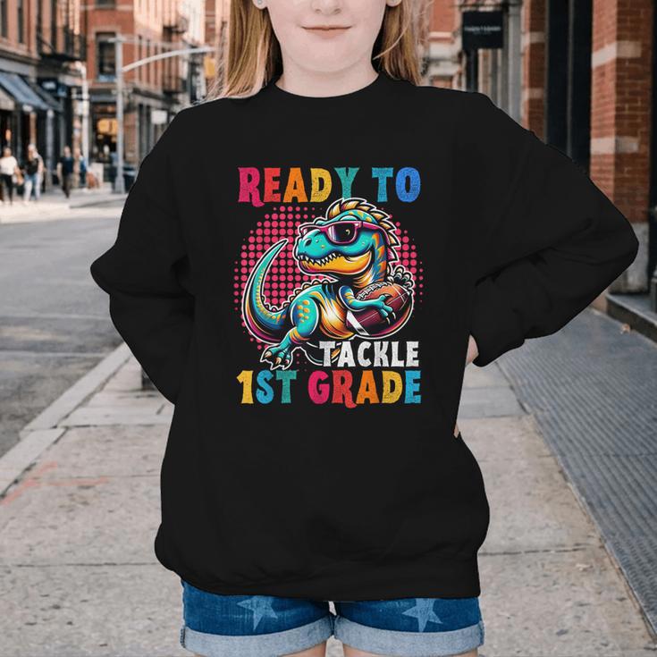 First Day Back To School 1st Grade Boys Football Dinosaur Youth Crewneck Sweatshirt