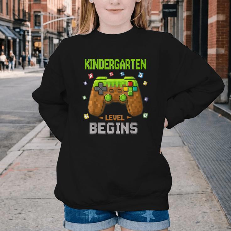 First Day Of Kindergarten Level Begins Back To School Youth Crewneck Sweatshirt