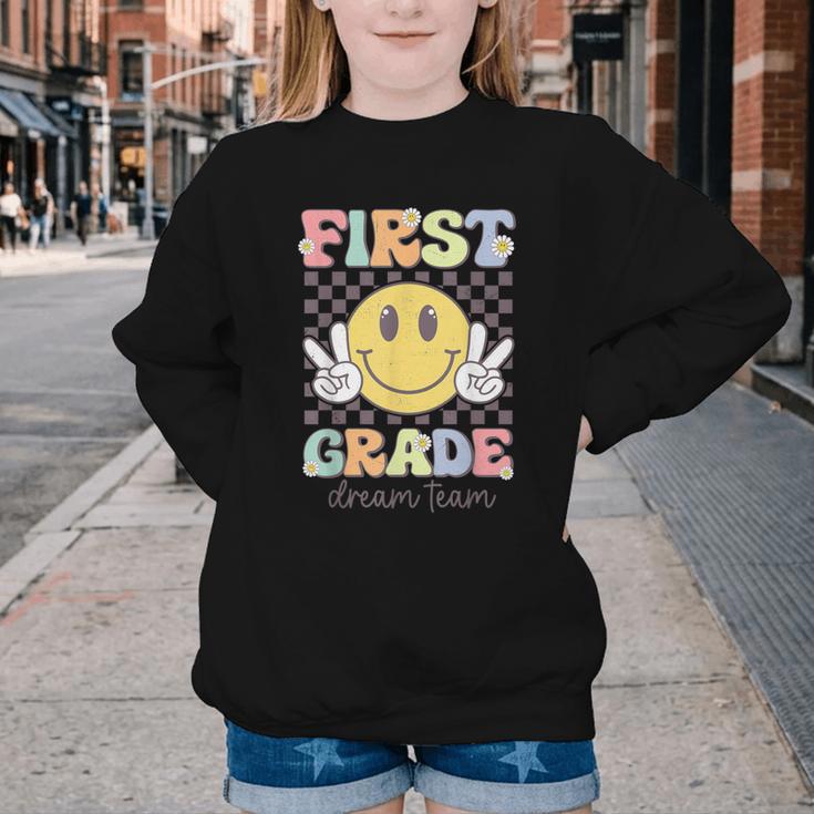 First Grade Dream Team Smile Face Back To School 1st Grade Youth Crewneck Sweatshirt First Grade Dream Team Smile Face Back To School 1st Grade Youth Crewneck Sweatshirt