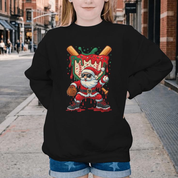 HUGvyn Santa Playing Baseball Ice Cream Drip Christmas Boys Youth Crewneck Sweatshirt HUGvyn Santa Playing Baseball Ice Cream Drip Christmas Boys Youth Crewneck Sweatshirt