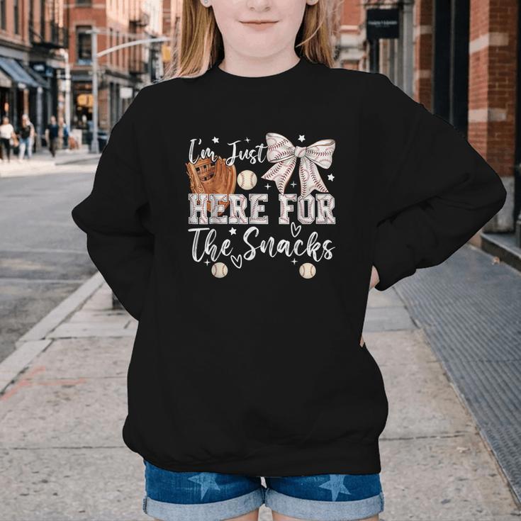 I'm Just Here For The Snacks Baseball Coquette Game Day Girl Youth Crewneck Sweatshirt