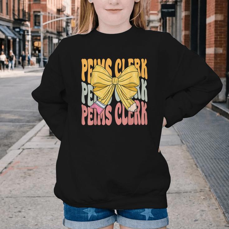 Peims Clerk Groovy Coquette Bow Cute Back To School Youth Crewneck Sweatshirt Peims Clerk Groovy Coquette Bow Cute Back To School Youth Crewneck Sweatshirt