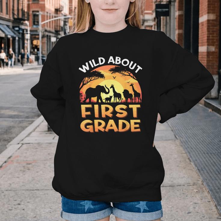 Wild About First Grade Zoo Animals Back To School Safari Youth Crewneck Sweatshirt Wild About First Grade Zoo Animals Back To School Safari Youth Crewneck Sweatshirt