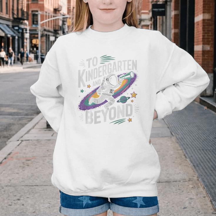 Back To School To Kindergarten And Beyond Astronaut In Space Premium Tri-Blend Youth Crewneck Sweatshirt Back To School To Kindergarten And Beyond Astronaut In Space Premium Tri-Blend Youth Crewneck Sweatshirt