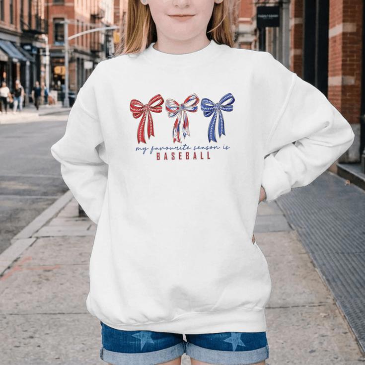 My Favorite Season Is Baseball Coquette Bow Game Day Mom Sis Youth Crewneck Sweatshirt My Favorite Season Is Baseball Coquette Bow Game Day Mom Sis Youth Crewneck Sweatshirt