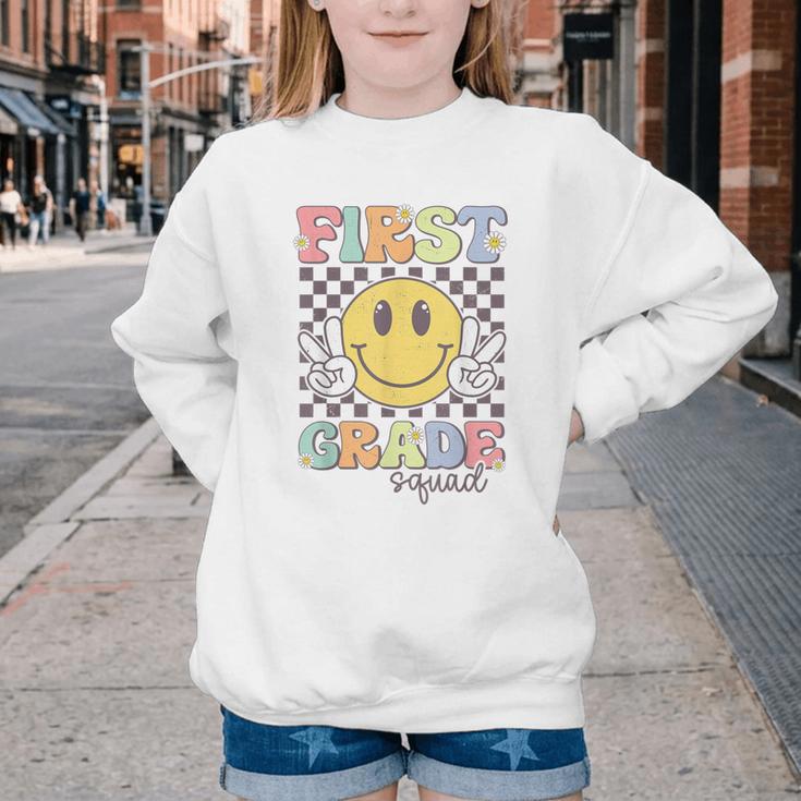 First Grade Squad Smile Face 1st Grade Back To School Youth Crewneck Sweatshirt First Grade Squad Smile Face 1st Grade Back To School Youth Crewneck Sweatshirt