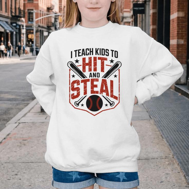 I Teach Kids To Hit And Steal Baseball Softball Coach Premium Tri-Blend Youth Crewneck Sweatshirt
