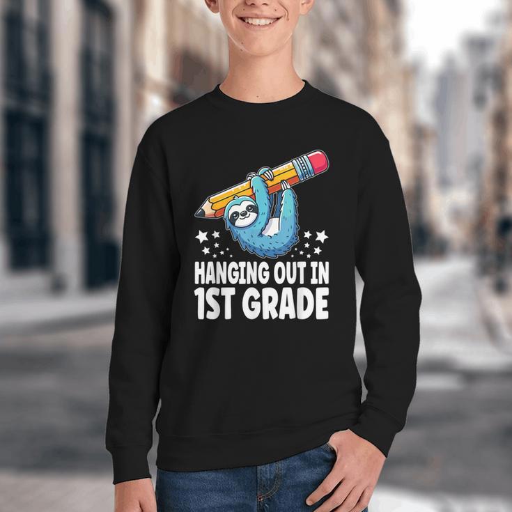 Back To School First Grade Sloth Hanging Out In 1st Grade Youth Crewneck Sweatshirt Back To School First Grade Sloth Hanging Out In 1st Grade Youth Crewneck Sweatshirt