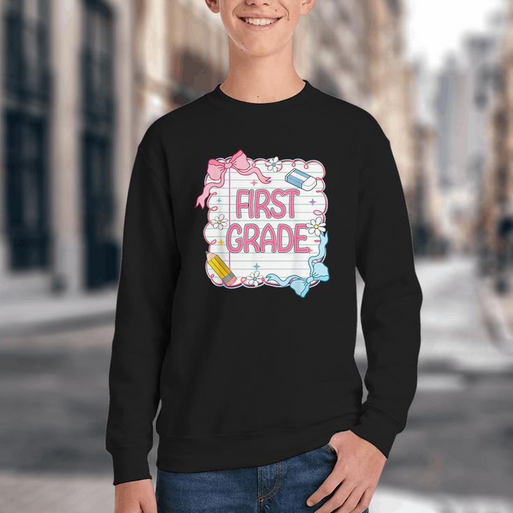 First Grade Back To School Girls Kids Coquette Bows Retro Youth Crewneck Sweatshirt First Grade Back To School Girls Kids Coquette Bows Retro Youth Crewneck Sweatshirt