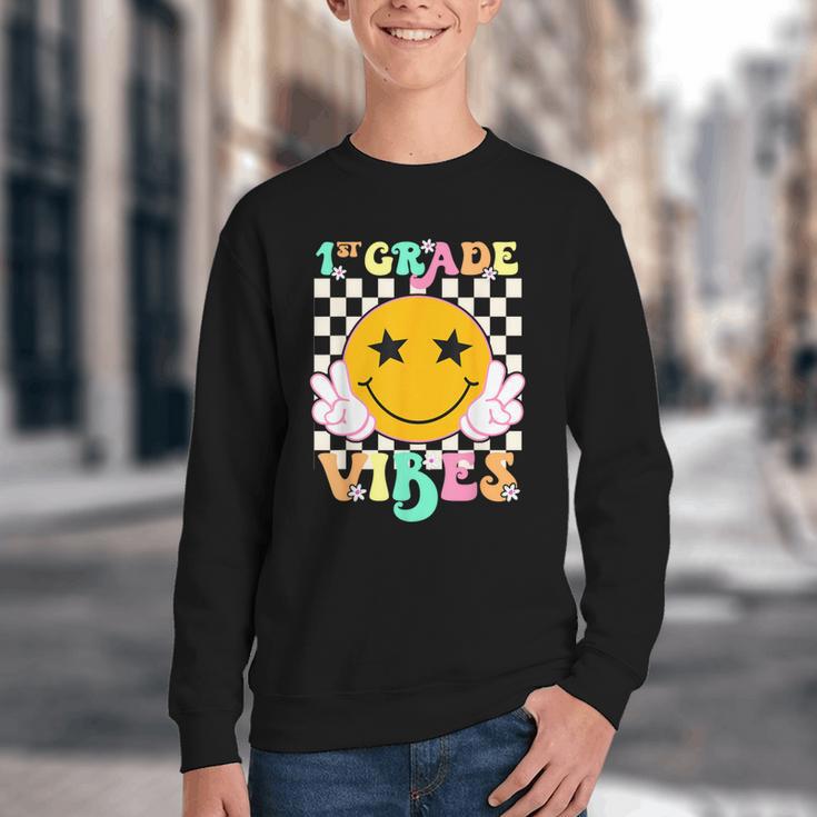 Girls 1st Grade Vibes Smile Face Back To School 1st Grade Youth Crewneck Sweatshirt Girls 1st Grade Vibes Smile Face Back To School 1st Grade Youth Crewneck Sweatshirt