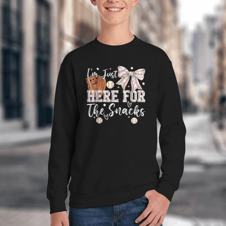 I'm Just Here For The Snacks Baseball Coquette Game Day Girl Youth Crewneck Sweatshirt