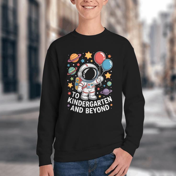 To Kindergarten And Beyond Astronaut Space Back To School Youth Crewneck Sweatshirt To Kindergarten And Beyond Astronaut Space Back To School Youth Crewneck Sweatshirt
