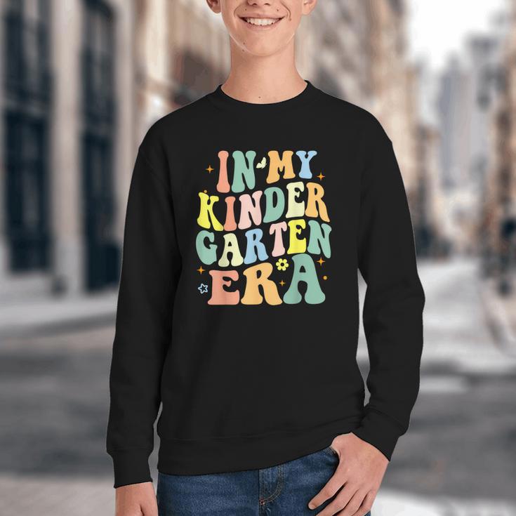 Kindergarten Era Happy Back To School Groovy Kids Boys Girls Youth Crewneck Sweatshirt Kindergarten Era Happy Back To School Groovy Kids Boys Girls Youth Crewneck Sweatshirt