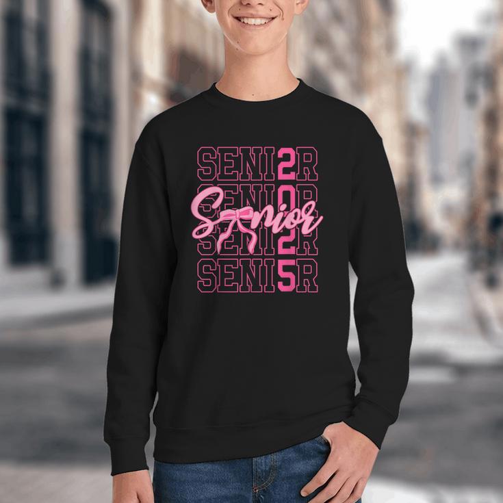 Senior 2025 Coquette Pink Bow Class Of 2025 Back To School Youth Crewneck Sweatshirt Senior 2025 Coquette Pink Bow Class Of 2025 Back To School Youth Crewneck Sweatshirt