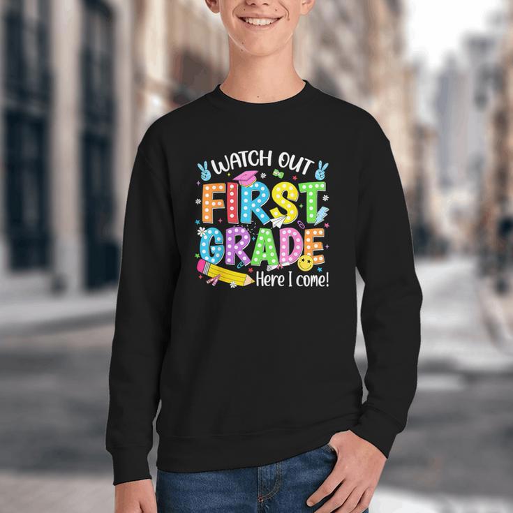 Watch Out First Grade Here I Come Back To School 1st Grade Youth Crewneck Sweatshirt