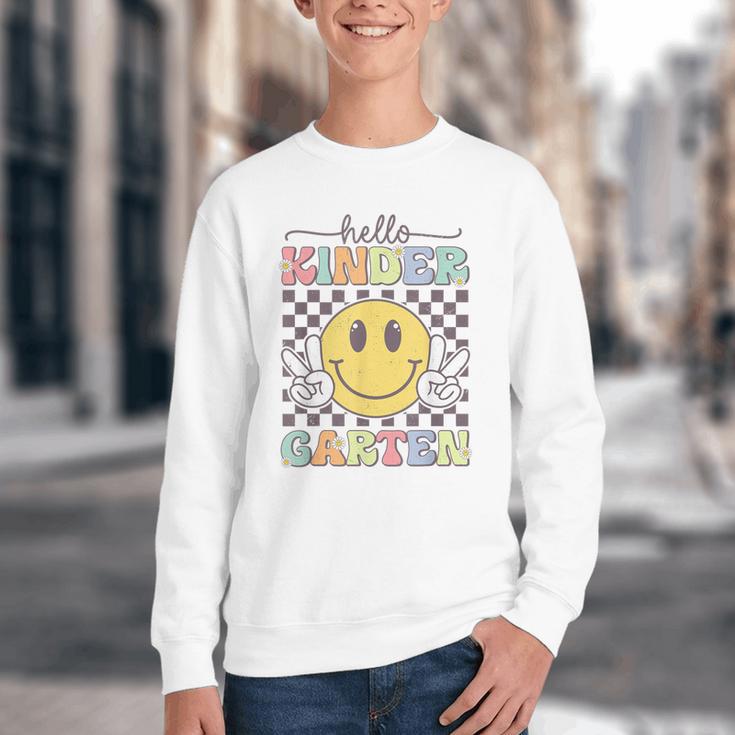 Hello Kindergarten Hippie Smile Face Back To School Youth Crewneck Sweatshirt Hello Kindergarten Hippie Smile Face Back To School Youth Crewneck Sweatshirt