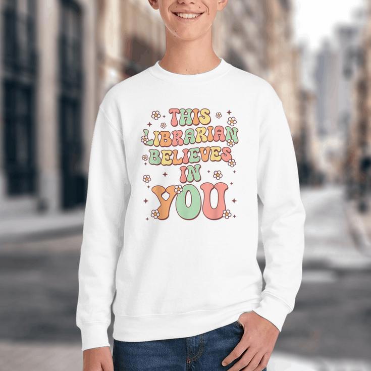 This Librarian Believes In You Groovy Back To School Youth Crewneck Sweatshirt