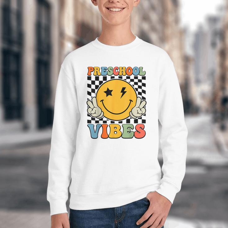 Preschool Vibes Retro Groovy Back To School Pre-K Youth Crewneck Sweatshirt Preschool Vibes Retro Groovy Back To School Pre-K Youth Crewneck Sweatshirt