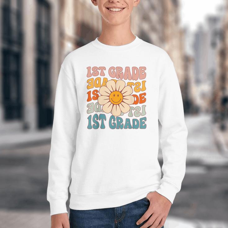Retro 1st Grade Daisy Colorful Back To School First Grade Youth Crewneck Sweatshirt Retro 1st Grade Daisy Colorful Back To School First Grade Youth Crewneck Sweatshirt