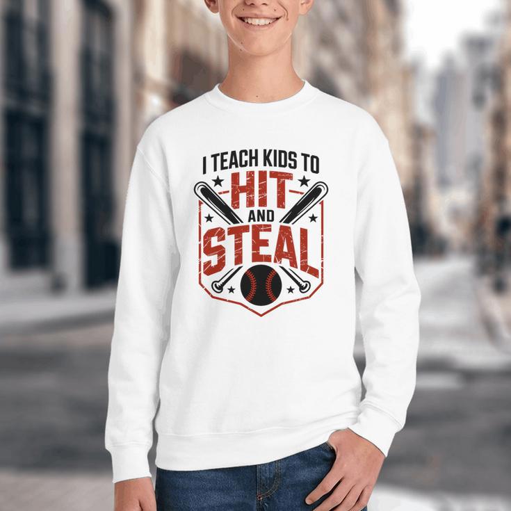I Teach Kids To Hit And Steal Baseball Softball Coach Premium Tri-Blend Youth Crewneck Sweatshirt
