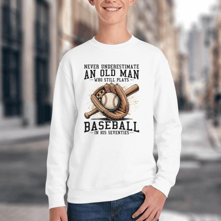 Never Underestimate Old Man Plays Baseball In His Seventies Youth Crewneck Sweatshirt Never Underestimate Old Man Plays Baseball In His Seventies Youth Crewneck Sweatshirt