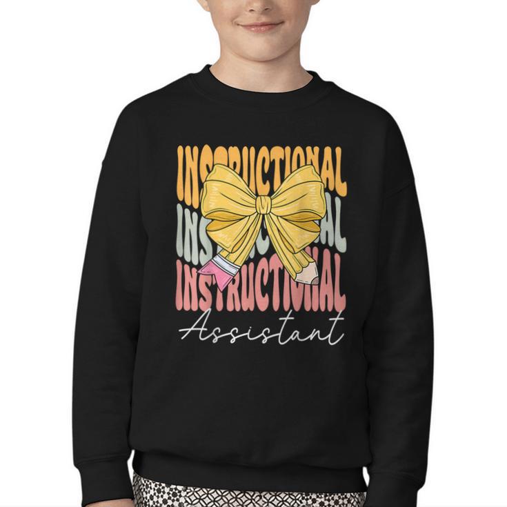 Instructional Assistant Groovy Coquette Bow Back To School Youth Crewneck Sweatshirt
