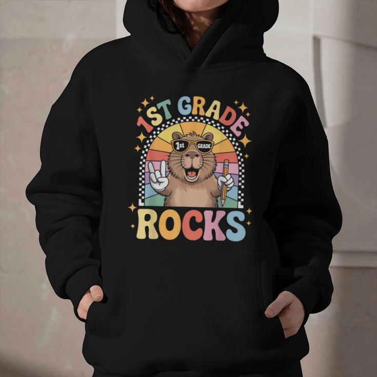 Back To School 1st Grade Capybara First Grade Rocks Graphic Youth Hoodie Back To School 1st Grade Capybara First Grade Rocks Graphic Youth Hoodie