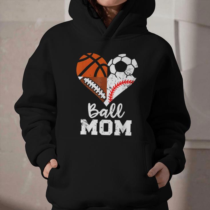 Ball Mom Heart Soccer Basketball Baseball Football Mom Graphic Youth Hoodie Ball Mom Heart Soccer Basketball Baseball Football Mom Graphic Youth Hoodie