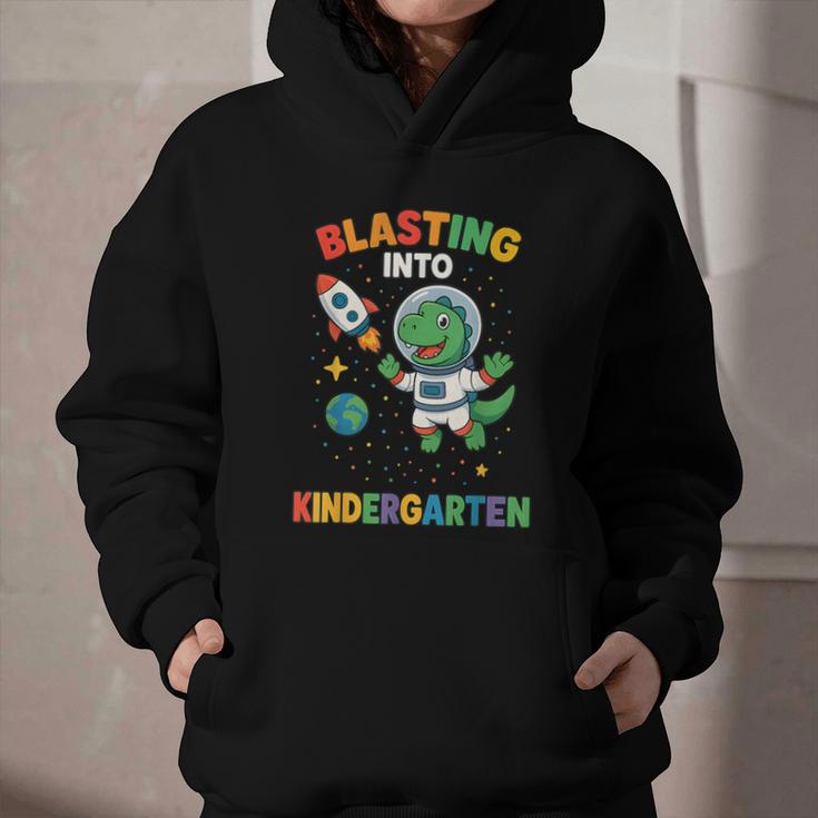 Blasting Into Kindergarten Dinosaur Astronaut Back To School Graphic Youth Hoodie Blasting Into Kindergarten Dinosaur Astronaut Back To School Graphic Youth Hoodie
