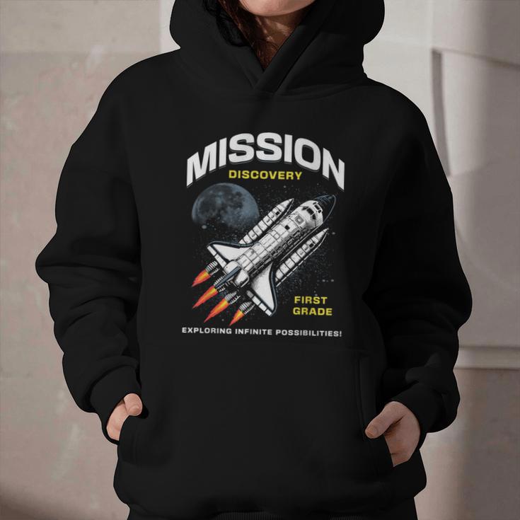 First Grade Back To School Space Rocket Astronaut Graphic Youth Hoodie First Grade Back To School Space Rocket Astronaut Graphic Youth Hoodie