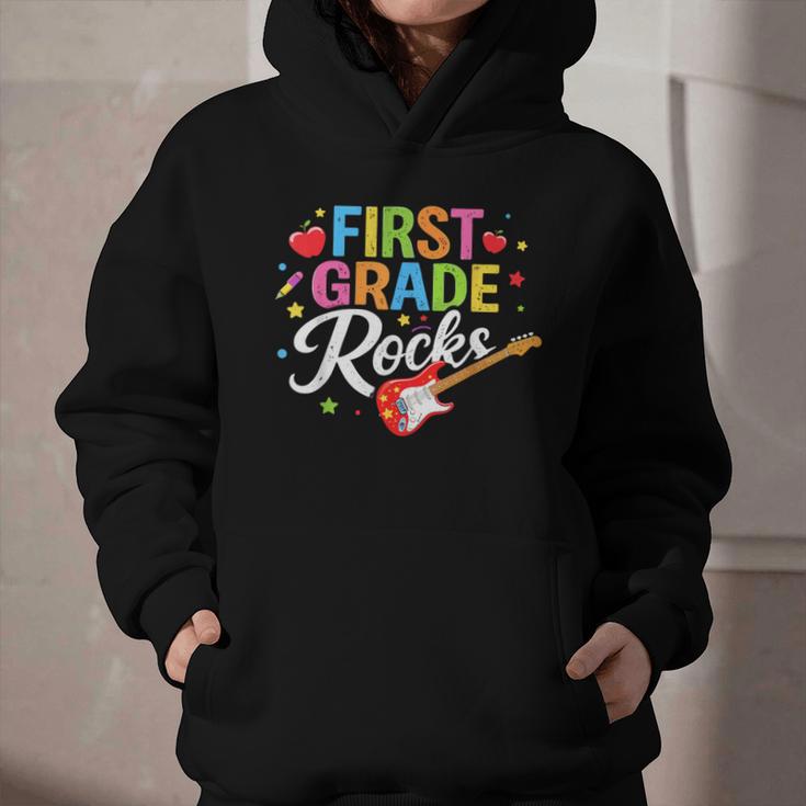 First Grade Rocks Colorful Back To School Guitar Graphic Youth Hoodie First Grade Rocks Colorful Back To School Guitar Graphic Youth Hoodie