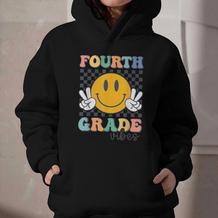 Fourth Grade Vibes Retro Smile Back To School 4th Grade Team Graphic Youth Hoodie Fourth Grade Vibes Retro Smile Back To School 4th Grade Team Graphic Youth Hoodie