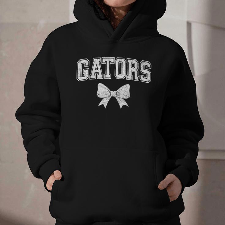 Gators High School Coquette Bow Gator Back To School Graphic Youth Hoodie Gators High School Coquette Bow Gator Back To School Graphic Youth Hoodie